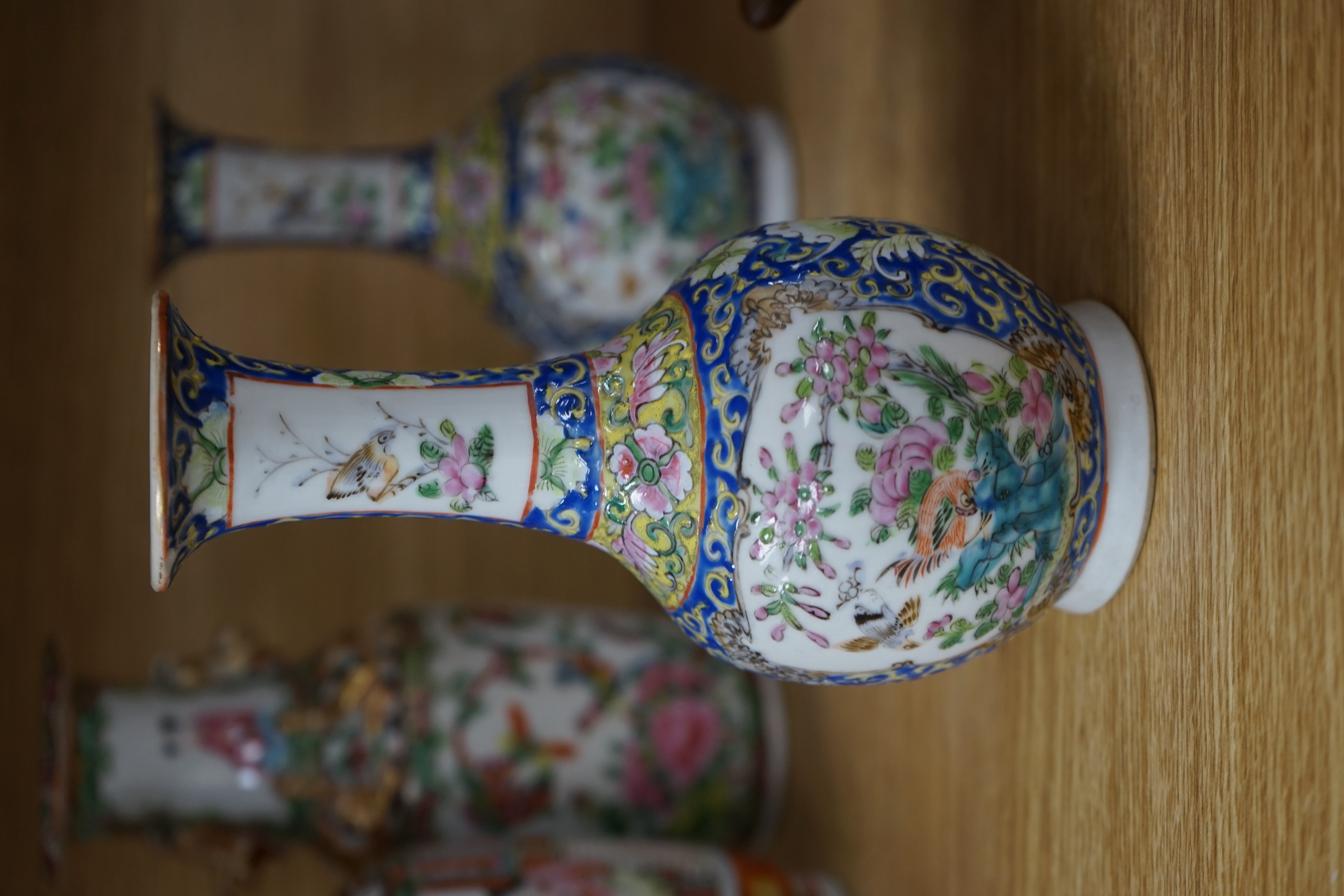 Four 19th century Chinese famille rose vases, 21cm